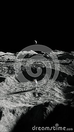 Vertical image of a space explorer standing on the moon's surface Stock Photo