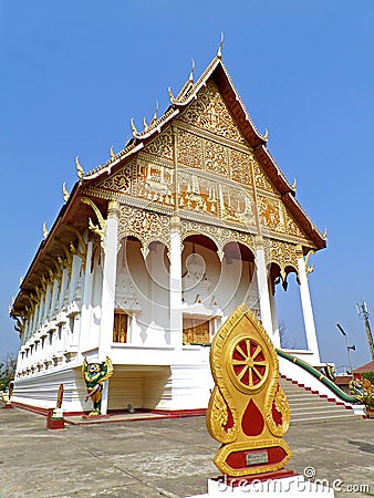 Vertical image of Wat That Luang Nua buddhist temple, the temple next to PhaThat Luang stupa in Vientiane, Laos Stock Photo