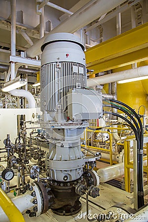 Vertical installation of gas compressor centrifugal type and electric motor used in oil and gas petroleum industry Stock Photo