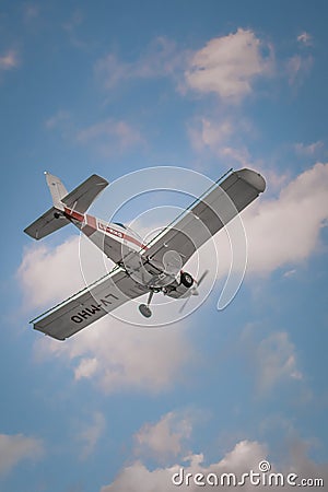 Vertical low angle shot of a light aircraft Editorial Stock Photo