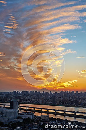 Vertical modern cityscape building bird eye aerial view with Mount Fuji under sunrise and morning blue bright sky in Tokyo,Japan Stock Photo