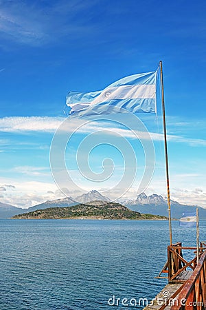 Vertical panoramic view of the Patagonian Mountains and the blue waters of the Beagle Channel in Tierra del Fuego Stock Photo