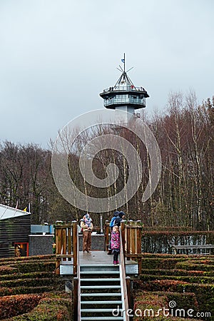 Vertical of people on a bridge of a labyrinth at the Drielandenpunt park in Vaals, The Netherlands Editorial Stock Photo