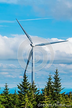 Vertical photo: A tall wind turbine Stock Photo