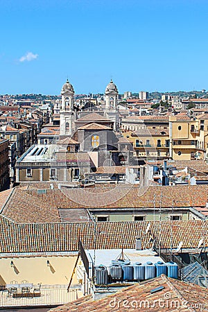 Vertical picture capturing amazing cityscape of Sicilian city Catania, Italy taken from above the old town. Catania has many Stock Photo