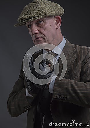 Angry gangster with his fists up ready to fight Stock Photo