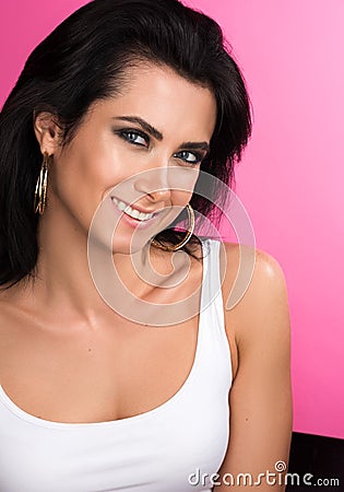 Vertical portrait of a beautiful young woman with a gentle smile Stock Photo