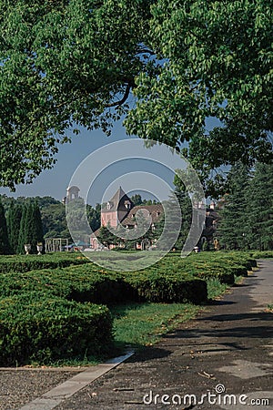 Vertical of the Prangins Castle in green woods in Switzerland Stock Photo