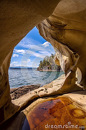 Vertical of a rocky coast at Retreat Cove, Galiano Island, Gulf Islands, BC Canada Stock Photo