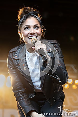 Vertical shot of Aimee Allen of The Interrupters performing in Rochester Hills, Michigan Editorial Stock Photo