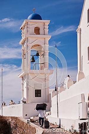 Vertical shot of the Anastasis Church with its Blue Dome and Tower in Santorini, Greece Editorial Stock Photo