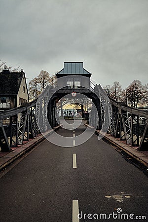 Vertical shot of an asphalt road on the metallic bridge in Cologne, Germany Editorial Stock Photo