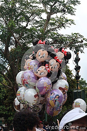 Vertical shot of balloons taken in Hong Kong`s Disneyland Editorial Stock Photo