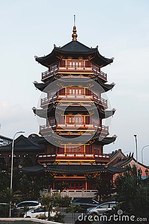 Vertical shot of a beautiful pagoda at the PIK Avenue against the blue sky in Jakarta, Indonesia Editorial Stock Photo