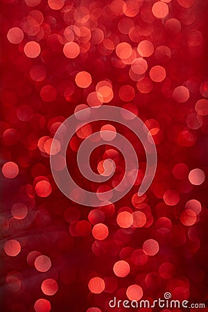 Vertical shot of a beautiful red blurred Christmas background with bokeh effect Stock Photo
