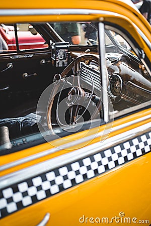 Vertical shot of a classic American yellow cab taxi interior Editorial Stock Photo