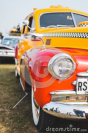 Vertical shot of a classic American yellow cab taxi Editorial Stock Photo