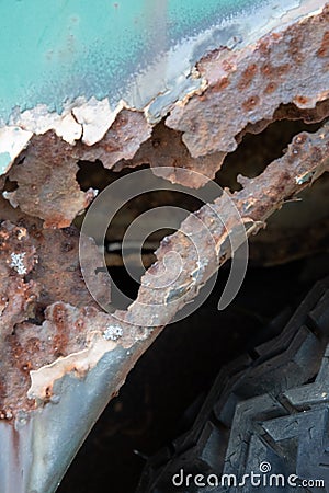 Vertical shot of details of a rusty car Stock Photo