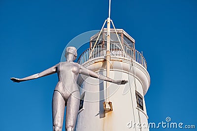 Vertical shot of the Diving Belle statue in Scarborough north yorkshire Editorial Stock Photo