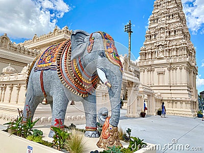 Vertical shot of an elephant statue at historic Karya Siddhi Hanuman Hindu Temple on a sunny day Stock Photo