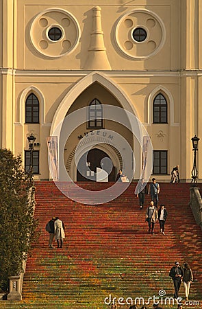 Vertical shot of the entrance of white Lublin Castle with stairs in the daytime in Lublin, Poland Editorial Stock Photo