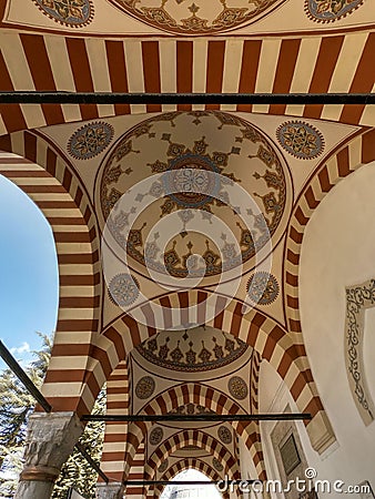 Vertical shot of the Eskisehir Kursunlu Mosque dome and ornaments Stock Photo