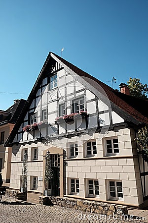 Vertical shot of a facade of a modern house under blue sky in Oerlinghausen Editorial Stock Photo
