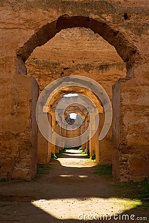 Vertical shot of the famous Heri es-Souani monument in Meknes, Morocco Stock Photo