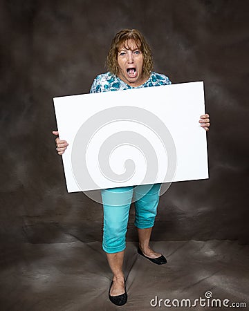 Furious Screaming Woman Holding Blank Sign Stock Photo