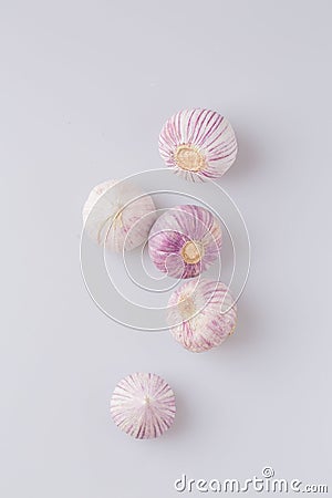 Vertical shot of garlic on a white background Stock Photo