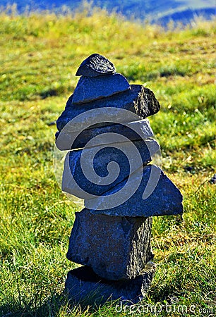 Vertical shot of granite stones balanced on each other Stock Photo