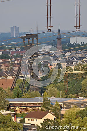 Vertical shot of high voltage power lines over a background of the Ruhr are Stock Photo