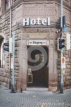 Vertical shot of a hotel entrance with a sign above in Konstanz, Germany Editorial Stock Photo