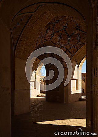Vertical shot of the interior of Agha Bozorg mosque in Iran. Stock Photo
