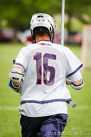 Vertical shot of a lacrosse player in the field Editorial Stock Photo