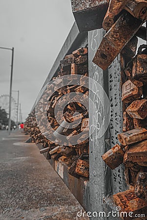 Vertical shot of the love locks bridge in Pasay, Philippines Editorial Stock Photo