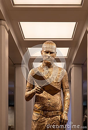 Vertical shot of Marc Quinns sculpture self-conscious Gene in the Science Museum Editorial Stock Photo