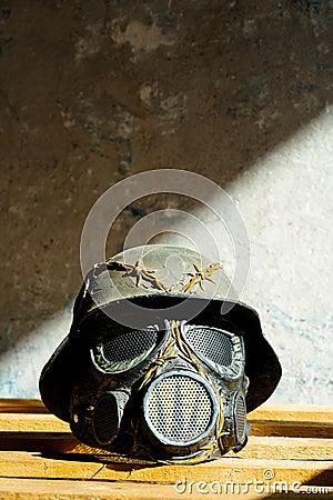 Vertical shot of mask with helmet props to play airsoft games or as a war decoration Stock Photo