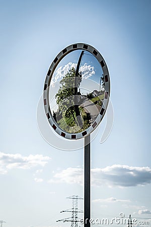 Vertical shot of mirror road sign in the street Stock Photo