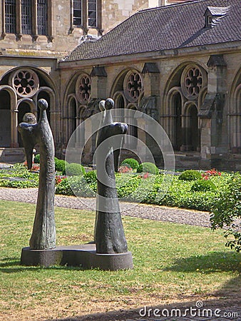 Modern statue in the garden of the High Cathedral of Saint Peter in Trier Editorial Stock Photo