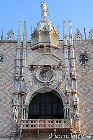 Vertical shot of the ornate statue in the southern part of the Doge's Palace in Venice, Italy Stock Photo