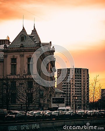 Vertical shot of the Palace of Justice in Bucharest against a sunset sky Editorial Stock Photo