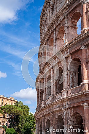 Vertical shot of a part of Colosseum against the blue sky Stock Photo
