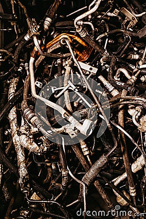 Vertical shot of a pile of rusty old metals Stock Photo