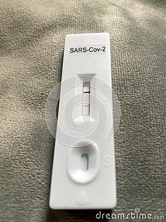 Vertical shot of positive covid-19 test Stock Photo