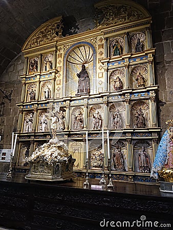 A vertical shot of religious sculptures in San Agustin Church Stock Photo