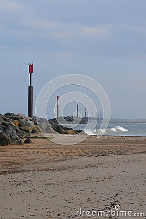 Vertical shot of Sea Palling Beach against a cloudy sky Stock Photo