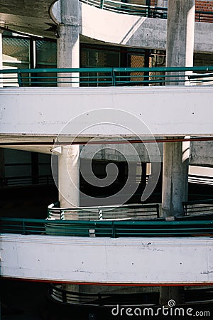 Vertical shot of a spiral ramp in a concrete parking garage Stock Photo