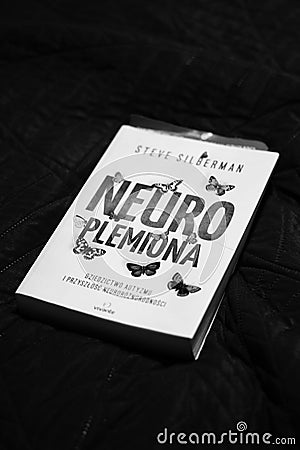 Vertical shot of the Steve Silberman Neuroplemiona book on a dark background Editorial Stock Photo