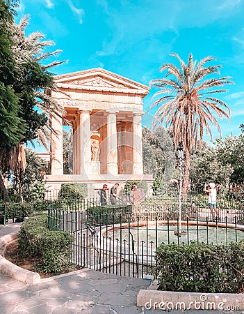 Vertical shot of tourists in Lower Barrakka Gardens in Malta, Valletta Editorial Stock Photo